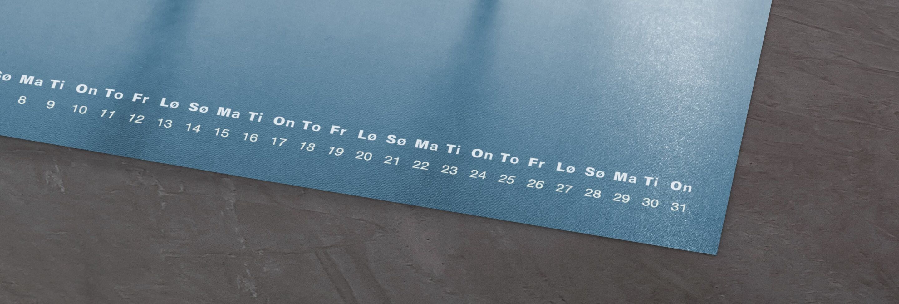 Kalender med datolinjer på en blå overflade