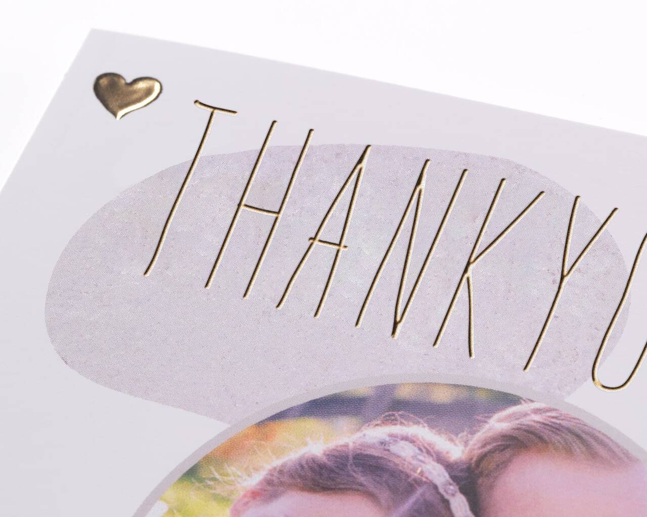 Hilsen kort med teksten 'THANK YOU' og et hjerte-symbol
