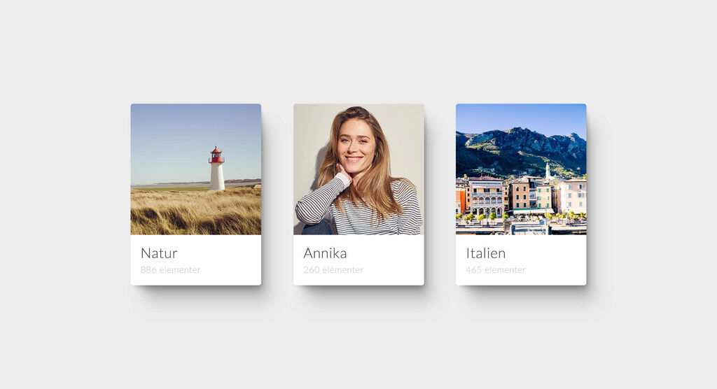 Tre kort viser forskellige emner: et fyrtårn i naturen, en person i casual skjorte og en italiensk by med farverige bygninger.