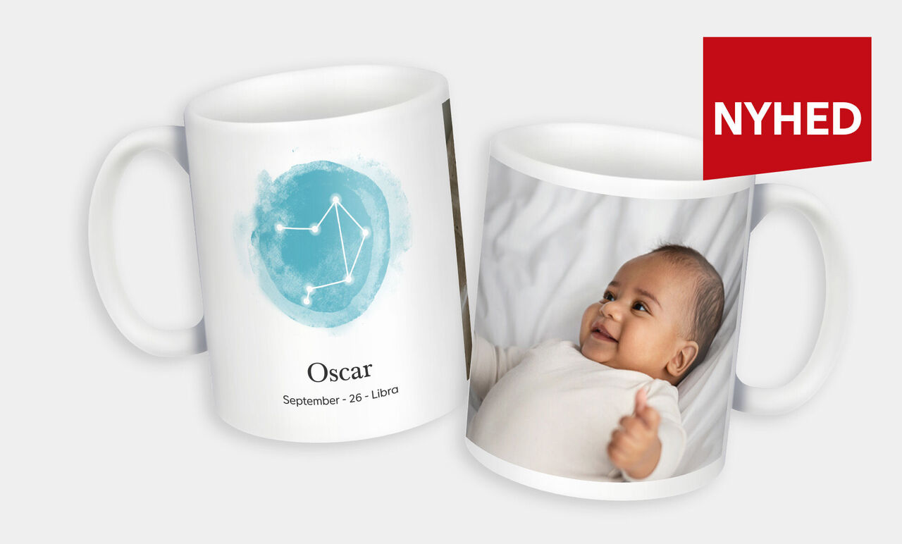 Kop med et fødselsdagsdesign og et babybillede