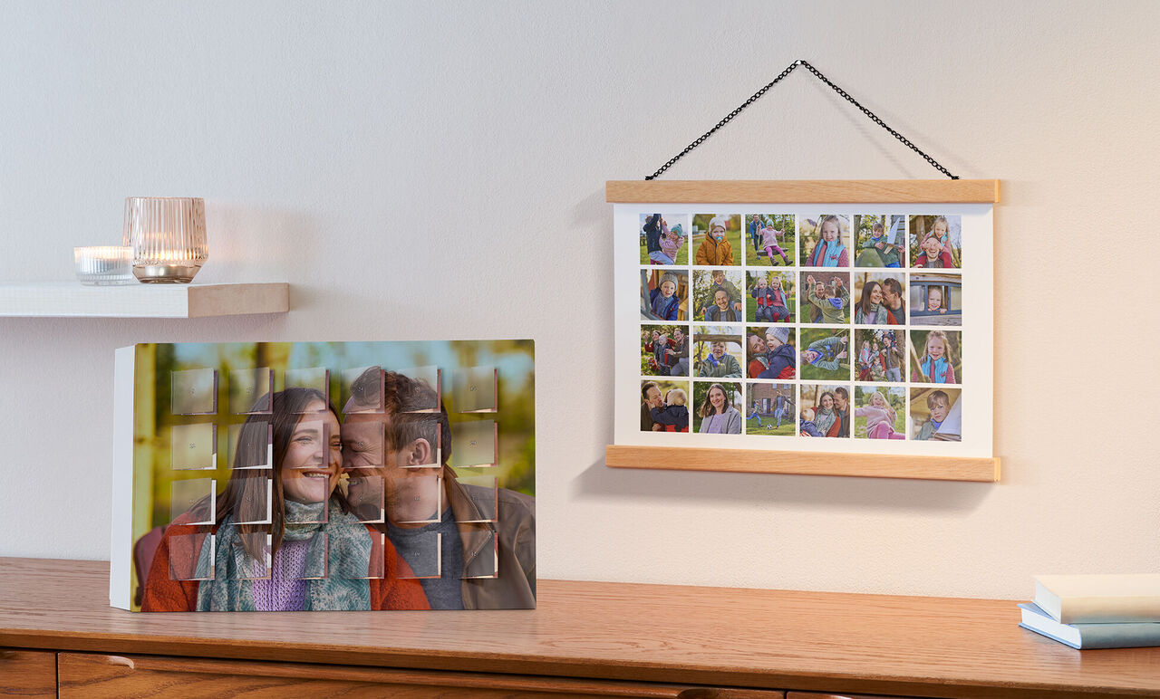 En smuk fotobog og en ramme med billeder.