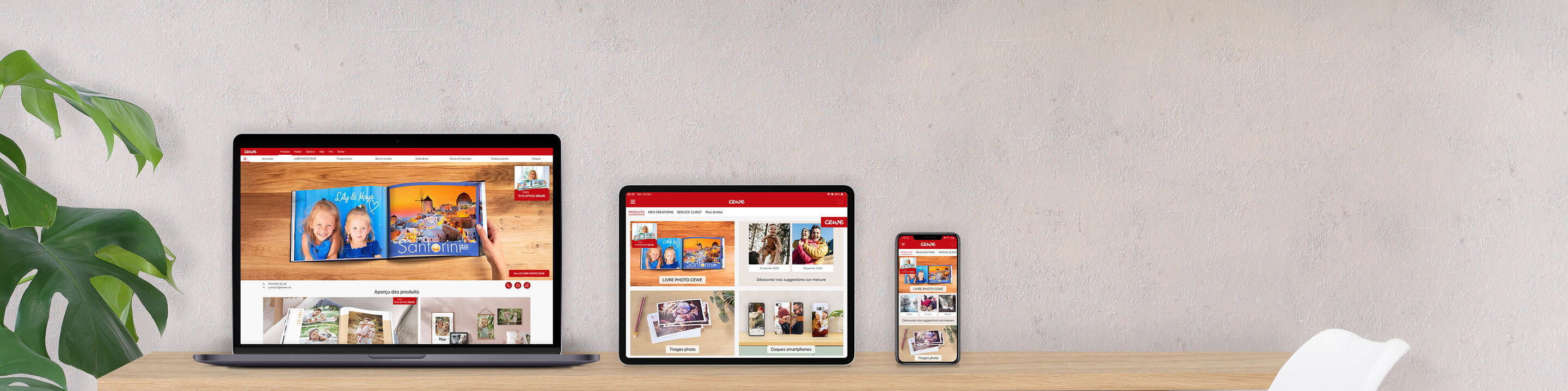 Tre enheder viser CEWE fotobog webstedet: laptop, tablet og smartphone.