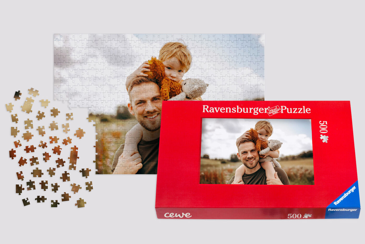 Et Ravensburger puslespil med et billede af et barn, der holder en bamse.